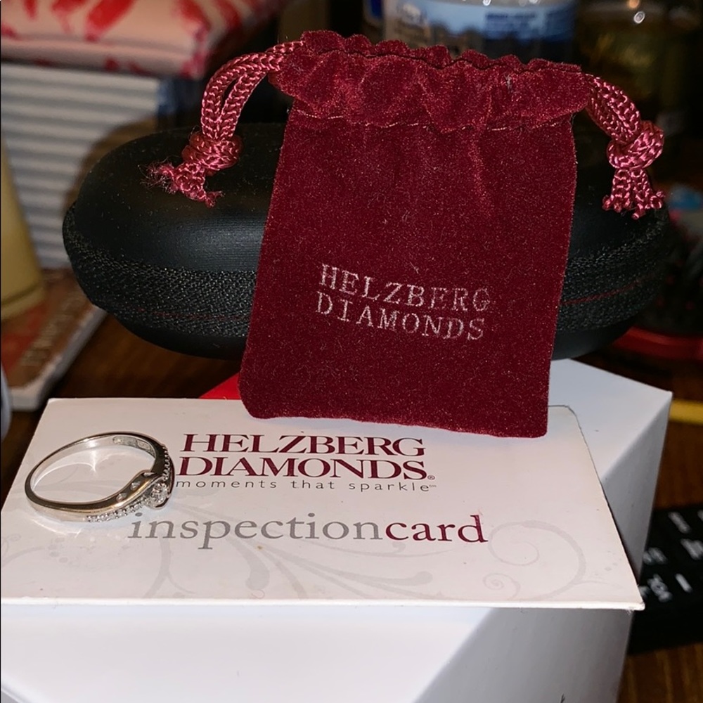 10 Kw white gold, .08 CT Helzberg Diamonds Ring